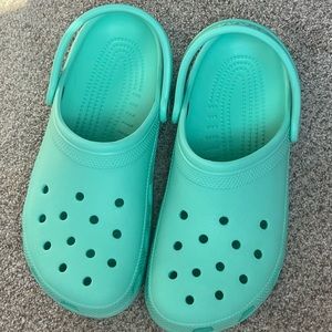 Aqua blue crocs